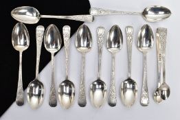 A SET OF LATE VICTORIAN SILVER TEASPOONS AND SUGAR TONGS, comprising eleven teaspoons and a pair