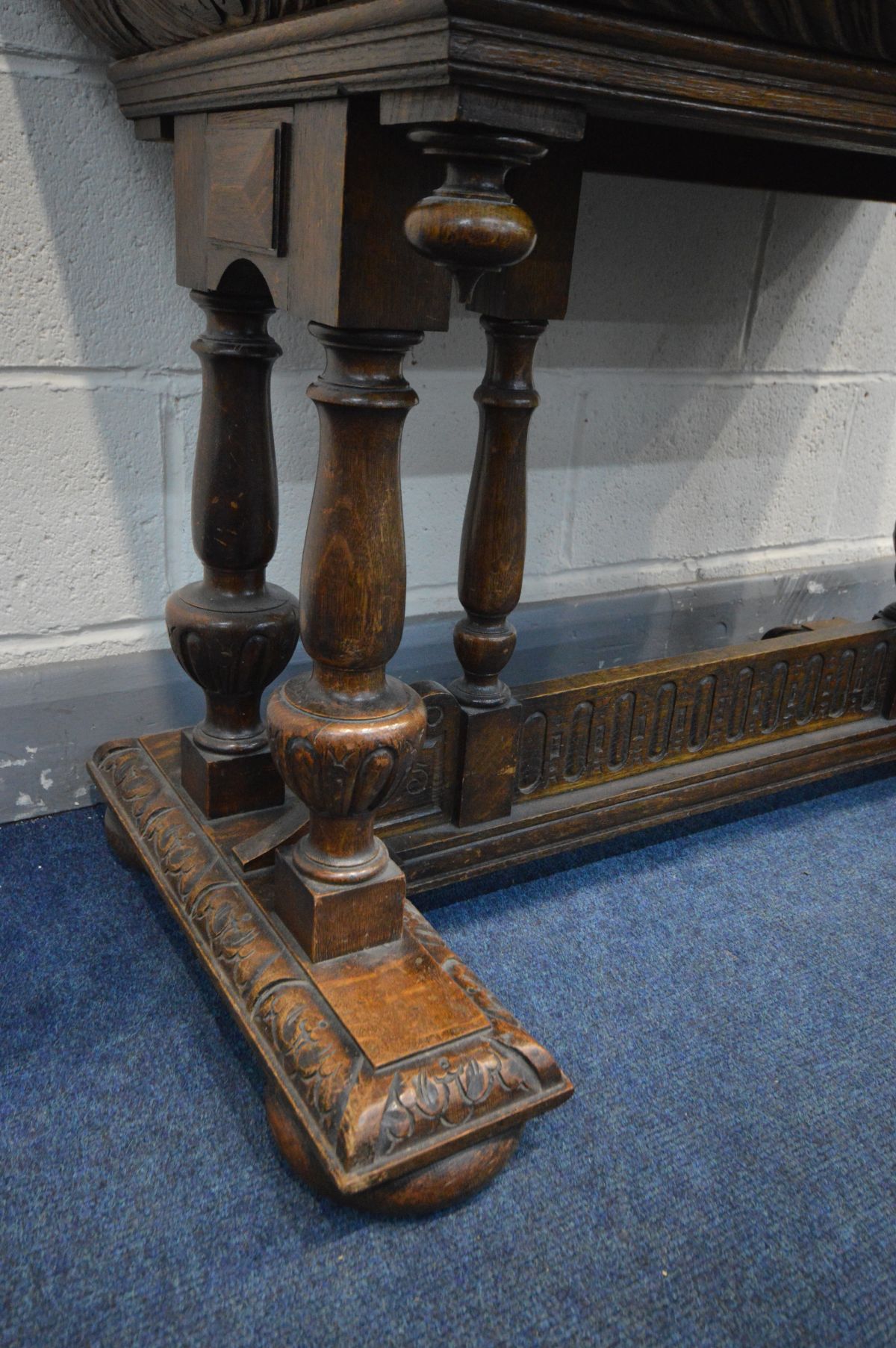 A 19TH CENTURY CARVED OAK CENTRE TABLE, rectangular top above a tapered frieze containing a long - Image 4 of 5