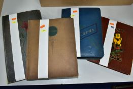 POSTCARDS, four albums containing approximately 825 early 20th Century postcards, including fine