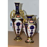 TWO ROYAL CROWN DERBY IMARI TWIN HANDLED VASES, the taller of baluster form with elongated neck,