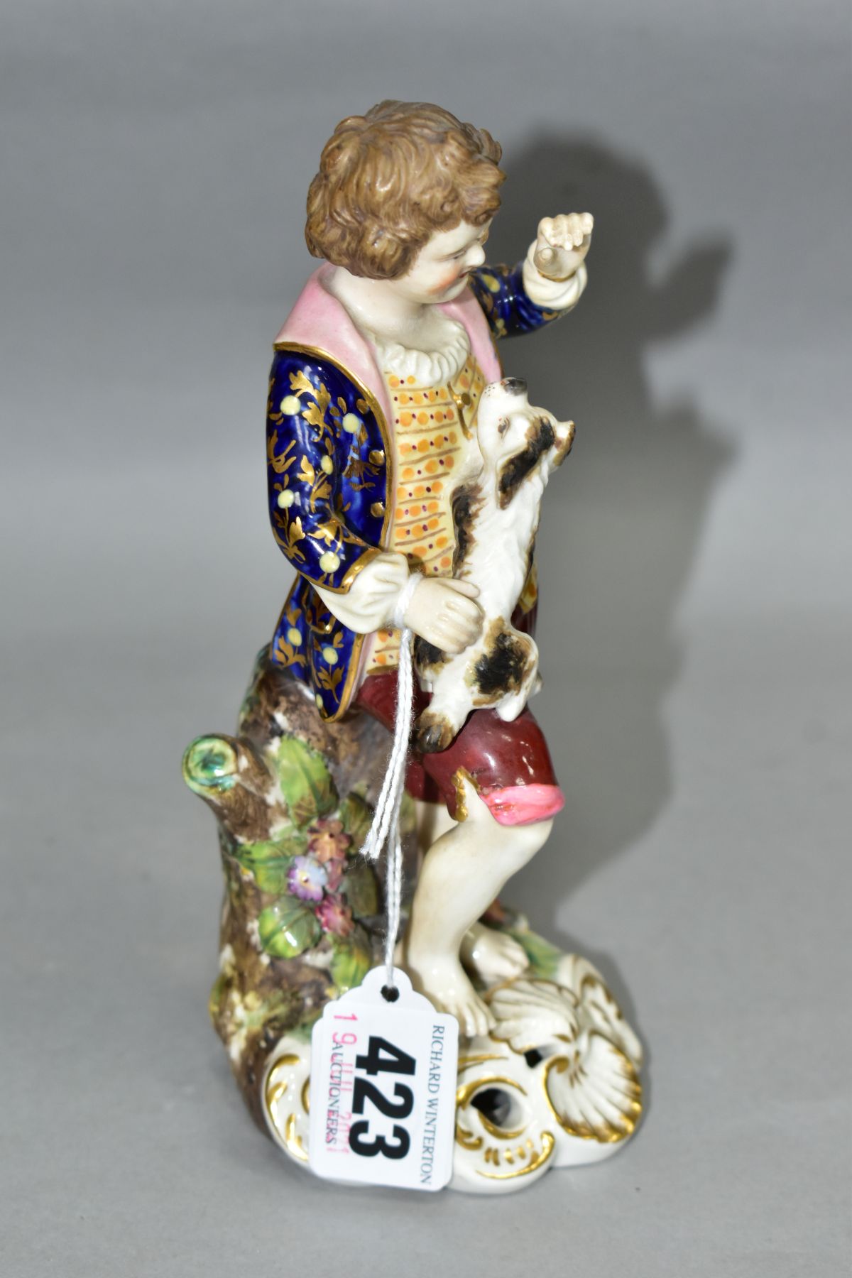 A STEVENSON & HANCOCK DERBY PORCELAIN FIGURE OF A BOY, modelled with a terrier standing on his knee, - Image 2 of 4