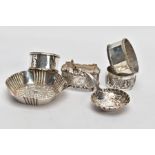 SIX ITEMS OF SILVERWARE, to include four single napkin rings, a decorative trinket bowl and a