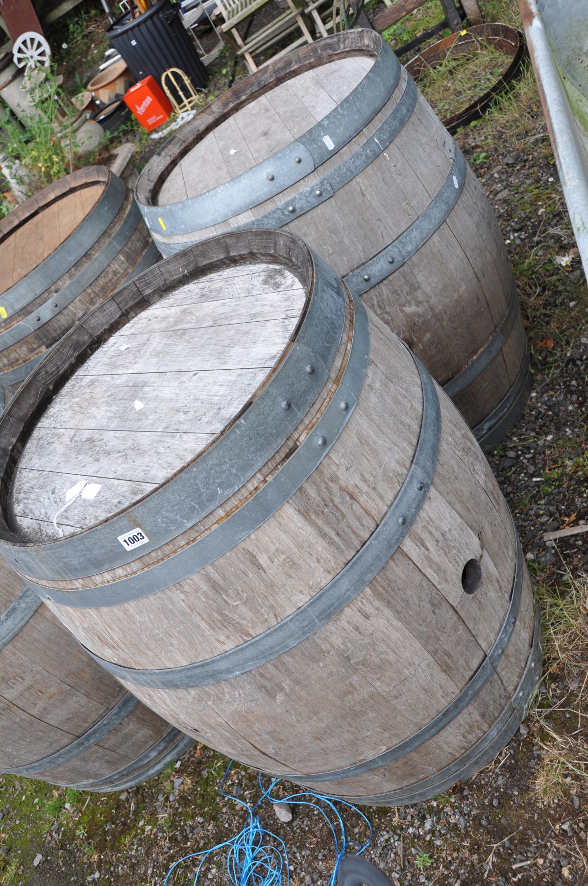A PAIR OF MODERN OAK BARRELS with galvanised banding height 88cm and 60cm diameter at top and bottom