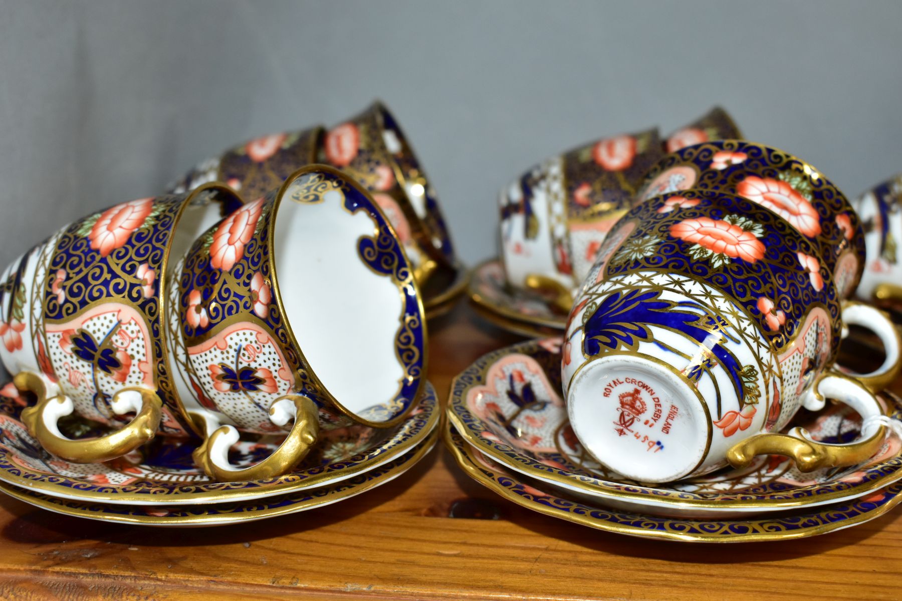 A LATE 19TH CENTURY SET OF TWELVE ROYAL CROWN DERBY IMARI COFFEE CUPS AND SAUCERS IN THE 4591 - Image 3 of 4