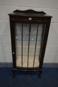 AN EARLY 20TH CENTURY MAHOGANY SINGLE DOOR CHINA CABINET, with two glass shelves, on ball and claw