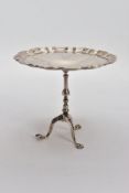 A SILVER MINIATURE TRIPOD TABLE, hallmarked Goldsmiths & Silversmiths Sheffield 1908, diameter