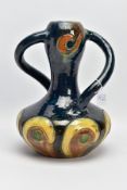 A TWIN HANDLED ART NOUVEAU BELGIAN STONEWARE VASE with stylised floral decoration