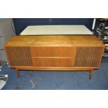 A MID CENTURY GRUNDIG ROSSINI 4 RADIOGRAM in teak cabinet fitted with a Dual 1210 turntable and