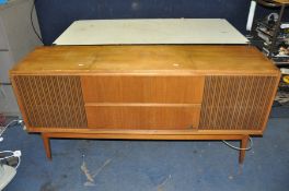 A MID CENTURY GRUNDIG ROSSINI 4 RADIOGRAM in teak cabinet fitted with a Dual 1210 turntable and