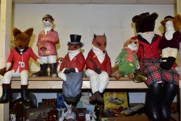 SEVEN ASSORTED ANTHROPOMORPHIC FOX FIGURES, comprising a Beatrix Potter Mr Tod soft toy, a seated