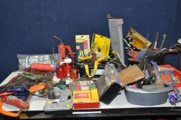 A COLLECTION OF TOOLS INCLUDING STILSONS, adjustable spanners, plumbers blowtorches, saws, wheel