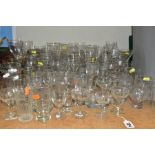 A QUANTITY OF ETCHED DRINKING GLASSES, mostly from pubs and hotels, and brewerys, etc, late 19th