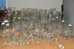 A QUANTITY OF ETCHED DRINKING GLASSES, mostly from pubs and hotels, and brewerys, etc, late 19th