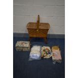 A VINTAGE WALNUT CANTILEVER SEWING BOX, a small sewing box, both containing sewing accessories,