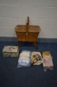 A VINTAGE WALNUT CANTILEVER SEWING BOX, a small sewing box, both containing sewing accessories,