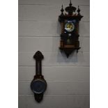 A LATE VICTORIAN WALNUT VIENNA WALL CLOCK, height 77cm and an Edwardian mahogany aneroid