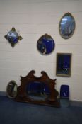 A COLLECTION OF WALL MIRRORS to include a Victorian style mahogany mantle mirror with a swan neck