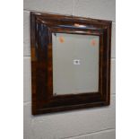 A WILLIAM AND MARY OYSTER WALNUT VENEERED CUSHION MOULDED WALL MIRROR, with stained pine