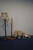 SEVEN VARIOUS LAMPS, to include an oak barley twist standard lamp, another oak standard lamp, four