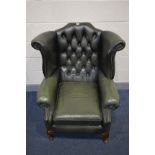 A GREEN LEATHER BUTTON BACK WINGBACK CHAIR on cabriole legs, width 90cm x depth 87cm x height