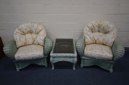 A GREEN WICKER THREE PIECE CONSERVATORY SUITE, comprising a pair of armchairs and a smoked glass top