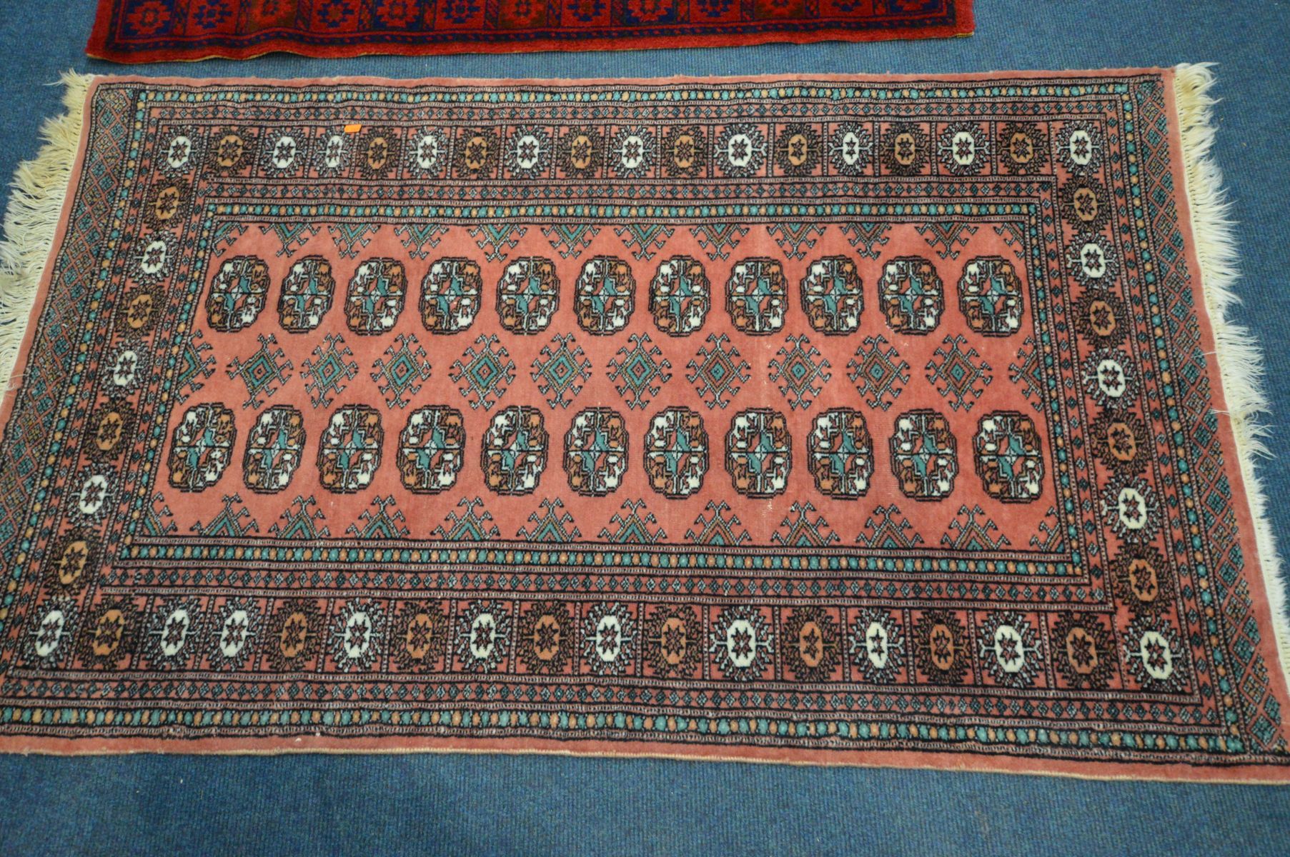 A LARGE WOOLLEN TABRIZ STYLE CARPET SQUARE, 346cm x 250cm and a pink tekke rug and a red rug (3) - Image 6 of 7