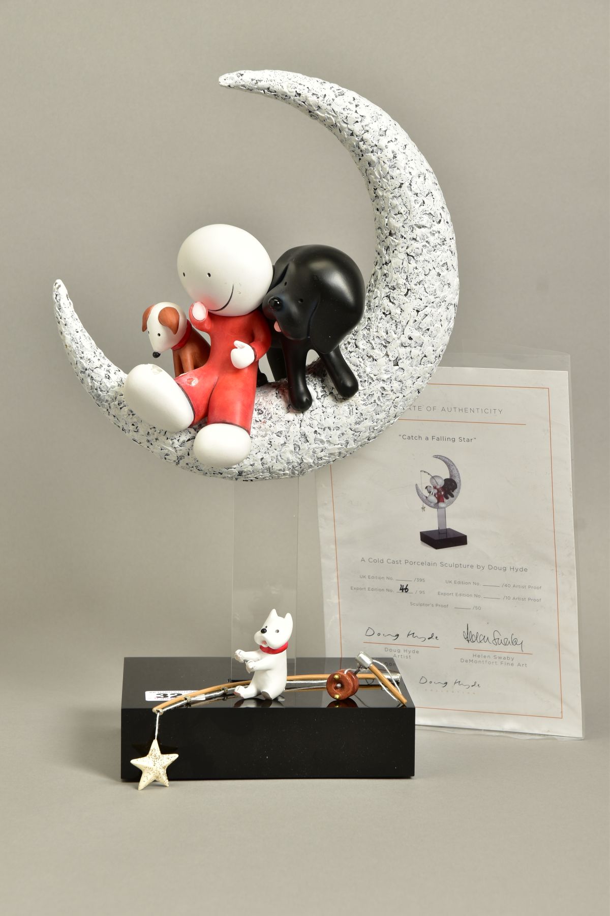 DOUG HYDE (BRITISH 1972) 'CATCH A FALLING STAR', an export edition sculpture of a boy and dog 46/
