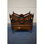 A GEORGE IV ROSEWOOD CANTERBURY, made up of three divisions, single drawer, on turned legs and brass