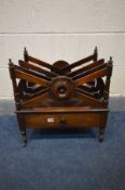 A GEORGE IV ROSEWOOD CANTERBURY, made up of three divisions, single drawer, on turned legs and brass