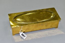 A WMF BRASS AND WOOD CIGARETTE BOX, Circa 1910, the hinged lid has a planished, oval panel, the