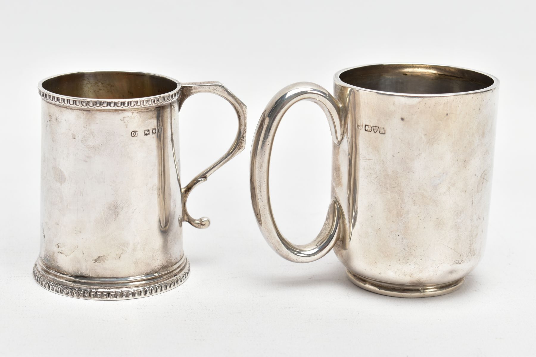 TWO EARLY 20TH CENTURY SILVER CHRISTENING MUGS, the first of plain design, hallmark for Chester