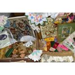 A QUANTITY OF ANTIQUE EMBROIDERED ITEMS to include a framed floral beadwork, crewel work rug,