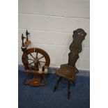 A LATE 20TH CENTURY HARDWOOD SPINNING WHEEL, with three rolls of cotton (missing one part) and an