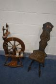 A LATE 20TH CENTURY HARDWOOD SPINNING WHEEL, with three rolls of cotton (missing one part) and an