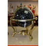 A BOXED GUILDFORD ASTRONOMICAL SOCIETY CELESTIAL GLOBE, supported by a brass metal stand inset
