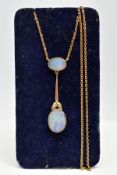 A YELLOW METAL OPAL PENDANT NECKLACE, the pendant designed with an oval cut opal within a milgrain