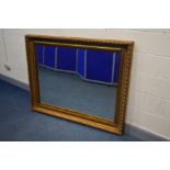 A LARGE RECTANGULAR GILTWOOD BEVEL EDGED WALL MIRROR, width 149cm x height 119cm x depth 85cm