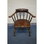 A VICTORIAN STYLE MAHOGANY SMOKERS CHAIR