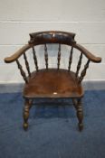 A VICTORIAN STYLE MAHOGANY SMOKERS CHAIR