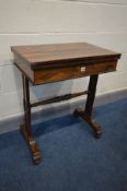 A REGENCY ROSEWOOD CARD TABLE, the fold over top enclosing an oval baize playing surface, single