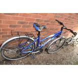 A GIANT ROCK SE LADIES MOUNTAIN BIKE with 21 speed Shimano gears , front suspension, 17in frame,