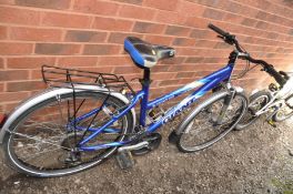 A GIANT ROCK SE LADIES MOUNTAIN BIKE with 21 speed Shimano gears , front suspension, 17in frame,