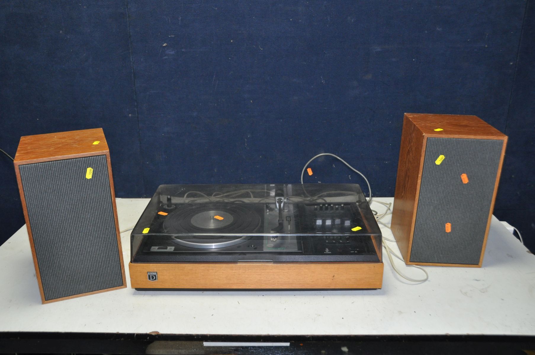 A DYNATRON HFC 51 MUSIC CENTRE with a Goldring G102 turntable and a pair of matching speakers (