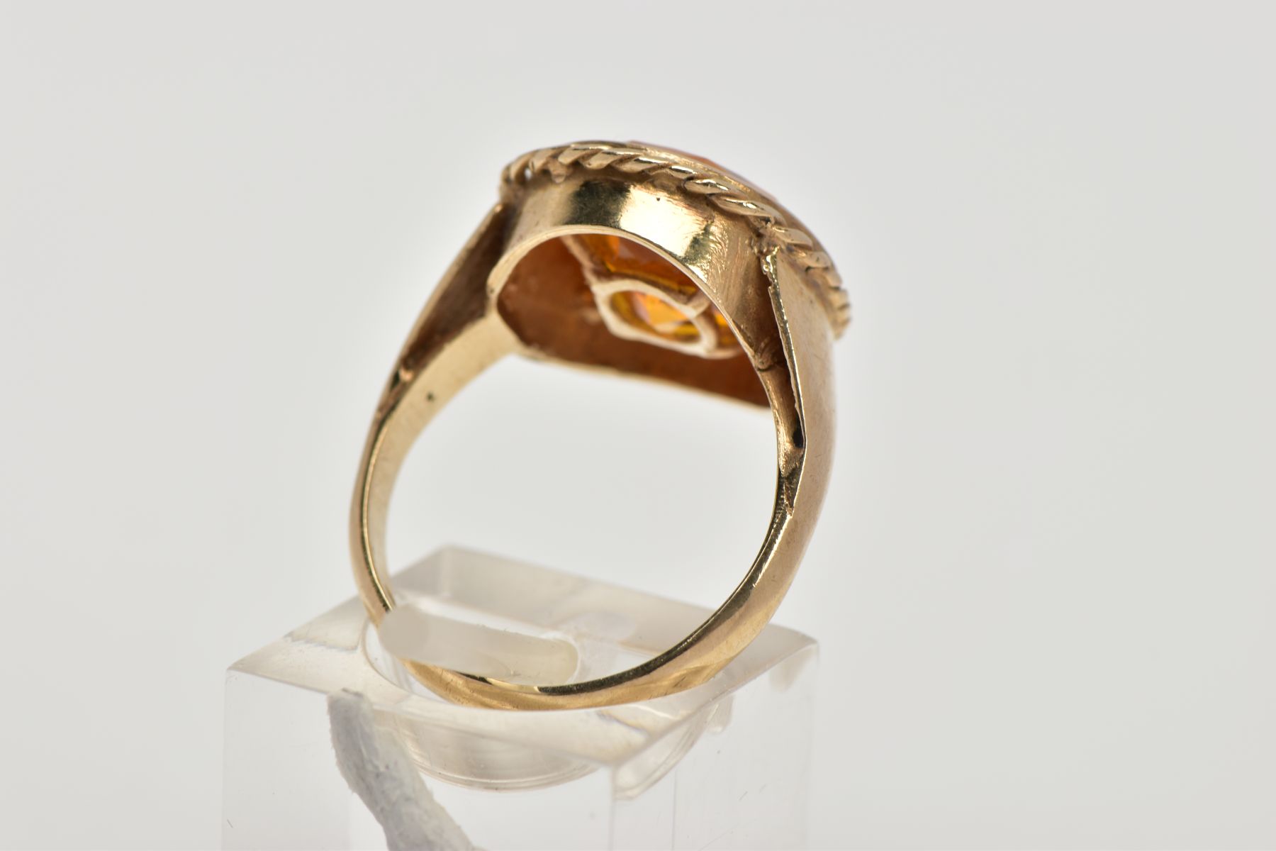 A 9CT GOLD SYNTHETIC ORANGE SAPPHIRE DRESS RING, designed with a large oval cut synthetic orange - Image 3 of 4