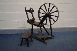 AN OAK SPINNING WHEEL constructed from repurposed Georgian and later timbers together with a foot