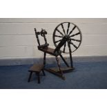 AN OAK SPINNING WHEEL constructed from repurposed Georgian and later timbers together with a foot