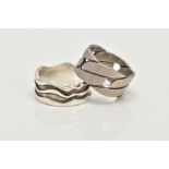 TWO SILVER WIDE BAND RINGS, to include a textured wavy designed wide band, approximate width 11.1mm,