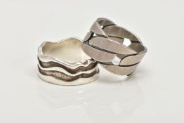 TWO SILVER WIDE BAND RINGS, to include a textured wavy designed wide band, approximate width 11.1mm,