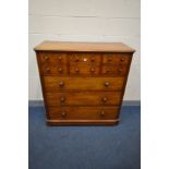 A VICTORIAN WALNUT CHEST OF EIGHT ASSORTED DRAWERS, with turned handles, width 118cm x depth 52cm