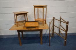 A PINE KITCHEN TABLE (alterations) along with two light wood occasional tables, a plywood guillotine